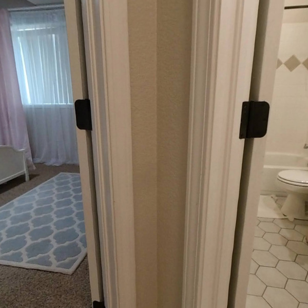Basement hallway bedroom 1